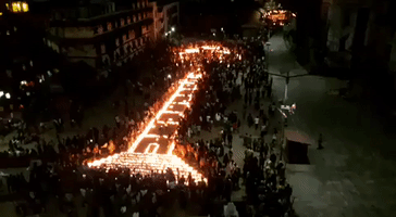 Kathmandu Vigil-Goers Recreate Collapsed Dharahara Tower With Candles