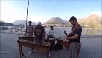 Talented Tourist Jams With Buskers in Cape Town