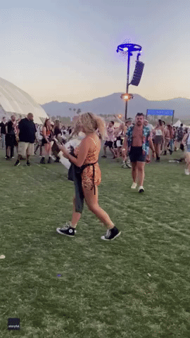 Paris Hilton's Bodyguard Chases After Star as She Dances Around Coachella