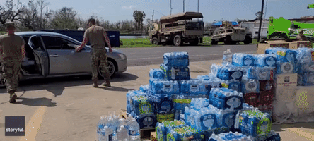 Military Personnel Distribute Aid in Houma, Louisiana