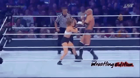 feminism punching GIF