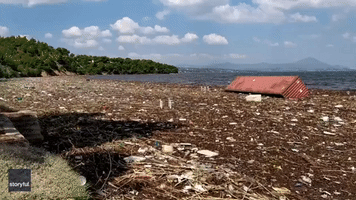 Debris Covers Greek Beach Following Deadly Storm on Evia Island