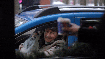 man-gets-coffee-to-go-at-drive-through-2026-01-22-