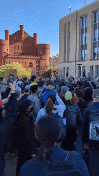 Protesters Push Against Police Line at UW-Madison