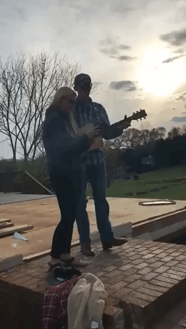 Tornado Survivor, 17, Sings on the Wreckage of His Former Home