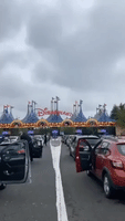 Visitors Honk Car Horns as They Wait for Disneyland Paris to Reopen