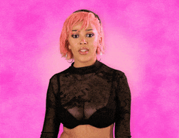 Celebrity gif. Doja Cat opens her mouth to speak multiple times, but holds her tongue as if speechless, touching her chin and gesturing with her hand.