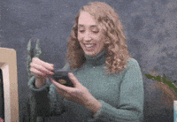 Attentive retro texting calling cellphone GIF