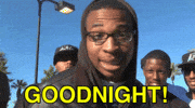 Video gif. Young man standing with a group of friends yells, “Goodnight!” as he jumps up into three of the friends’ arms. They catch him in a horizontal position as he rests his head in his hands and closes his eyes. The rest of the group reacts in surprised delight.