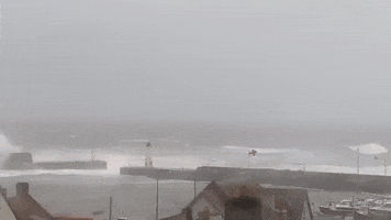 Storm Babet Thrashes Scottish Lighthouse