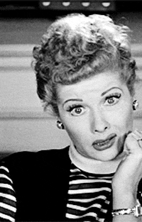 Celebrity gif. Lucille Ball looks at us with her head resting on her hands. She cringes, and shifts from one hand to the other, looking away uncomfortably.