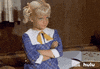 TV gif. Susan Olsen as Cindy in The Brady Bunch crosses her arms and shakes her head in disapproval.