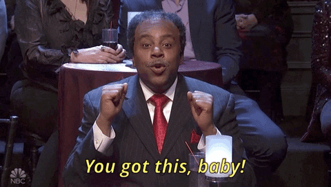 SNL gif. Comedian Kenan Thompson sits at a club table in a suit, raises his fists in encouragement and says "You've got this, baby!"