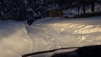 Steep Banks of Snow Narrow Roads Around Lake Tahoe After Record Falls