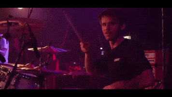 Mindblind grin leon drumming mindblind GIF
