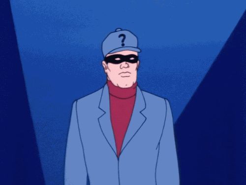 Cartoon gif. Wearing a bandit mask and a blue blazer with a cap that adorns a question mark, The Riddler shrugs and appears confused.
