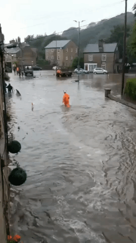 River Dean Bursts Banks, Flooding Cheshire Town of Bollington