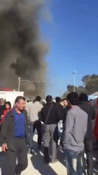 Smoke Rises Over Lesvos Reception Center as Migrants Protest
