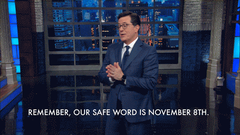 TV gif. Stephen Colbert on The Late Show rubs his hands together and says, "Remember, our safe word is November 8th," which appears as text.