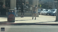 Shirtless Man Performs Ballroom Dance on San Diego Sidewalk