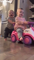 Baby Boy Belly Laughs While Pushing Twin Sister