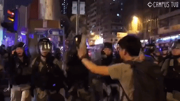 Riot Police Pepper Spray Protesters During Recent Close-Range Clash