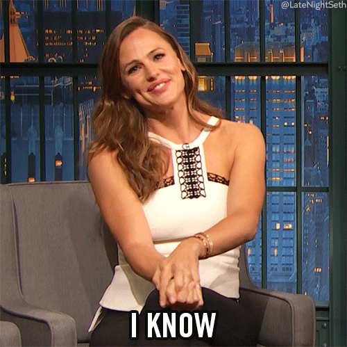 Celebrity gif. Jennifer Garner on Late Night with Seth Meyers smiles and says, “I know.”
