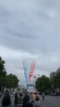 French Air Force Jets Fly Over Paris During Bastille Day Celebrations