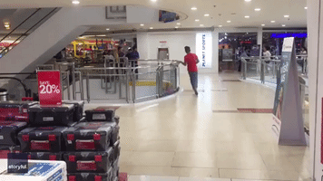 Panicked Shoppers Flee as Gunman Reportedly Takes Hostages at Manila Mall