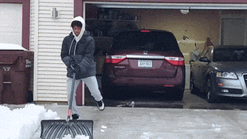 High School Student Dances While Clearing Snow 