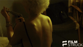 anjelica huston gun GIF by FilmStruck