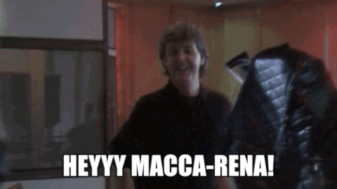 Celebrity gif. Paul McCartney shimmies forward and smiles. Text, "Heyyy macca-rena!"