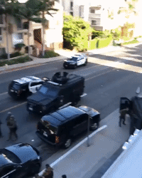 SWAT Team Surround West Hollywood Apartment After Standoff With Armed Man