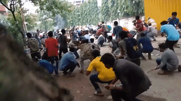 Police and Student Protesters Clash Outside Dhaka University