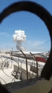 Huge Plume of Smoke Rises Over Blast Site Near Mogadishu Airport