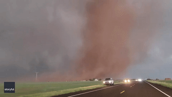 Powerful Tornado Crosses Road in North Texas