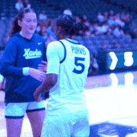 XavierWBB ncaa basketball xavier tp seatbelt GIF