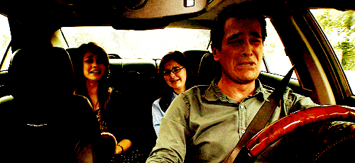 modern family tears of laughter GIF