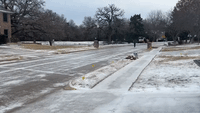 Man Skates Down Street in North Texas as Ice Storms Grip Region