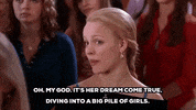 diving into a big pile of girls GIF