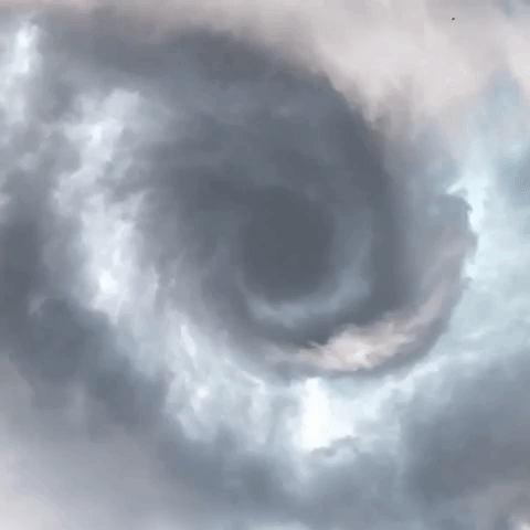 Storm Chaser Directly Under Tornado's 'Mouth'
