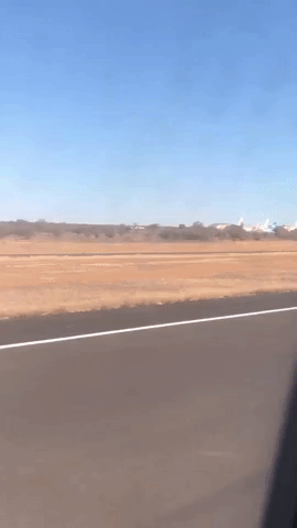 Planes Sit in Storage at Alice Springs Airport During International Aviation Shutdown