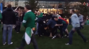 Fans Enjoy Rugby Scrum Outside Wembley Stadium