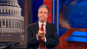 daily show slow clap GIF