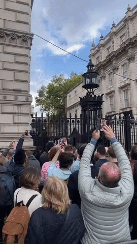 British Public Gather Outside 10 Downing Street as Truss Resigns