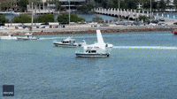 Wrecked Seaplane Towed to Shore After Crash Off Miami