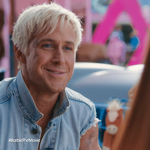 Movie gif. Ryan Gosling as Ken in Barbie winks, smiling a sexy smirk.