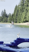 Barefoot Waterskier Hangs From Low Flying Helicopter