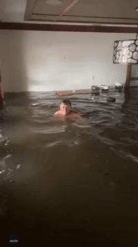 'Beautiful Day for a Swim': Man Floats Around Flooded Naples Home
