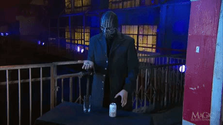 masked magician GIF